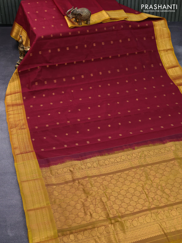 Gadwal silk cotton saree maroon and mustard yellow with allover zari woven buttas and zari woven border