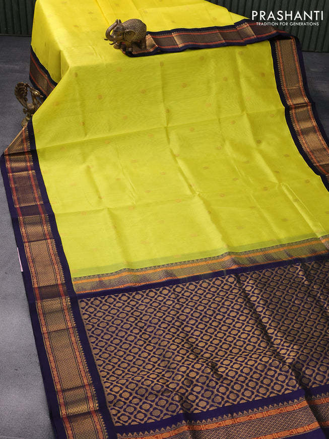 Silk cotton saree lime yellow and dark blue with rudhraksha zari woven buttas and zari woven korvai border
