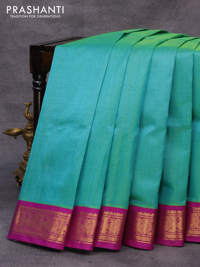 Silk cotton saree teal blue and purple with allover vairaosi pattern and annam zari woven korvai border