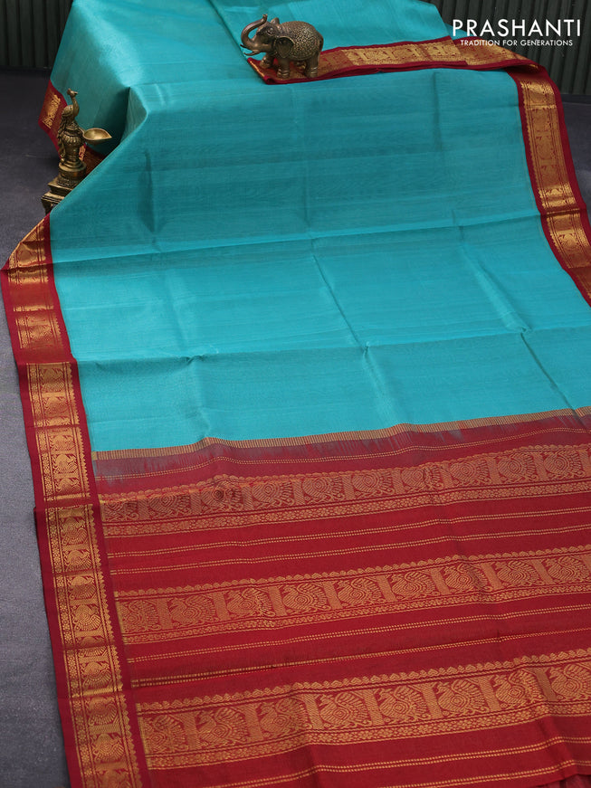Silk cotton saree teal blue and maroon with allover vairaosi pattern and annam zari woven korvai border
