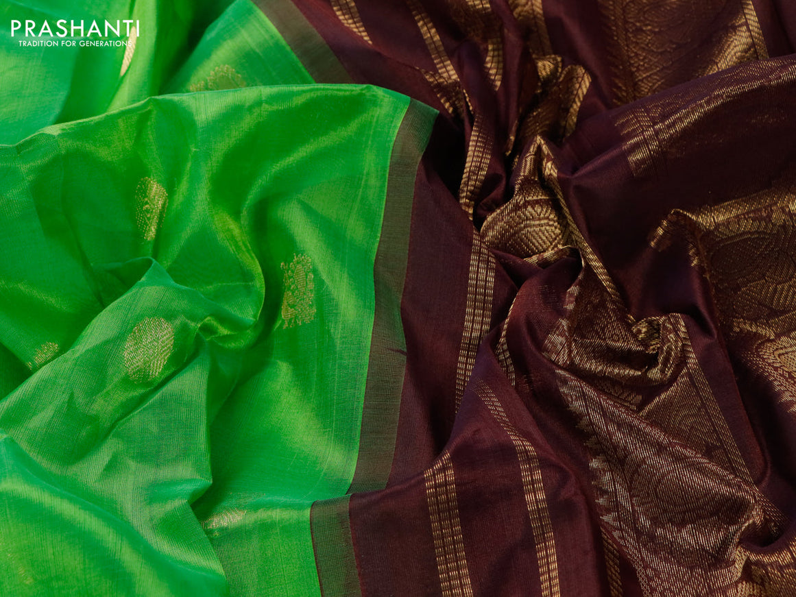Silk cotton saree parrot green and coffee brown with annam & rudhraksha zari woven buttas and annam zari woven korvai border