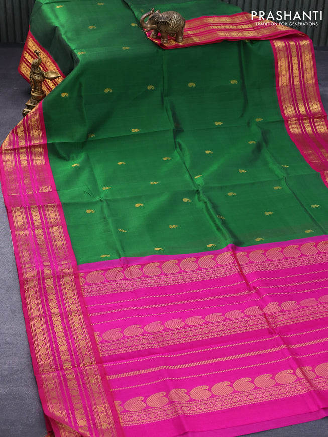 Silk cotton saree dark green and magenta pink with paisley zari woven buttas and long zari woven border