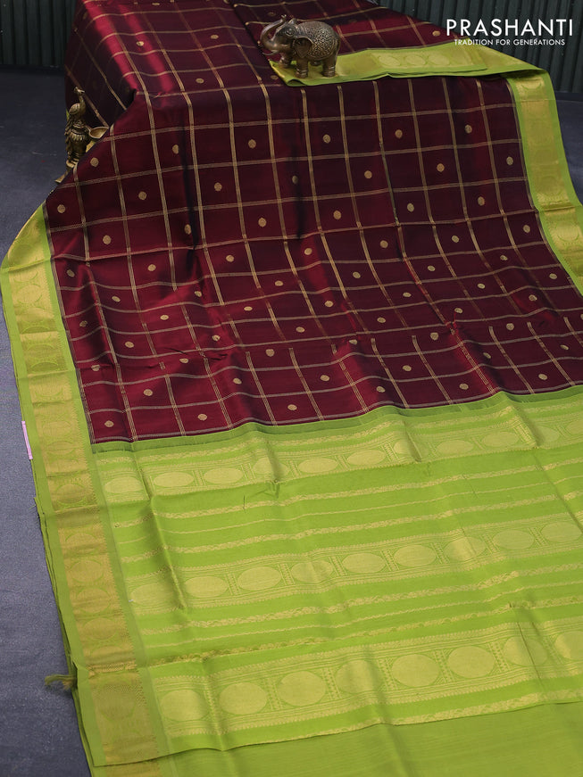 Silk cotton saree maroon and light green with allover zari checks & buttas and rudhraksha zari woven korvai border