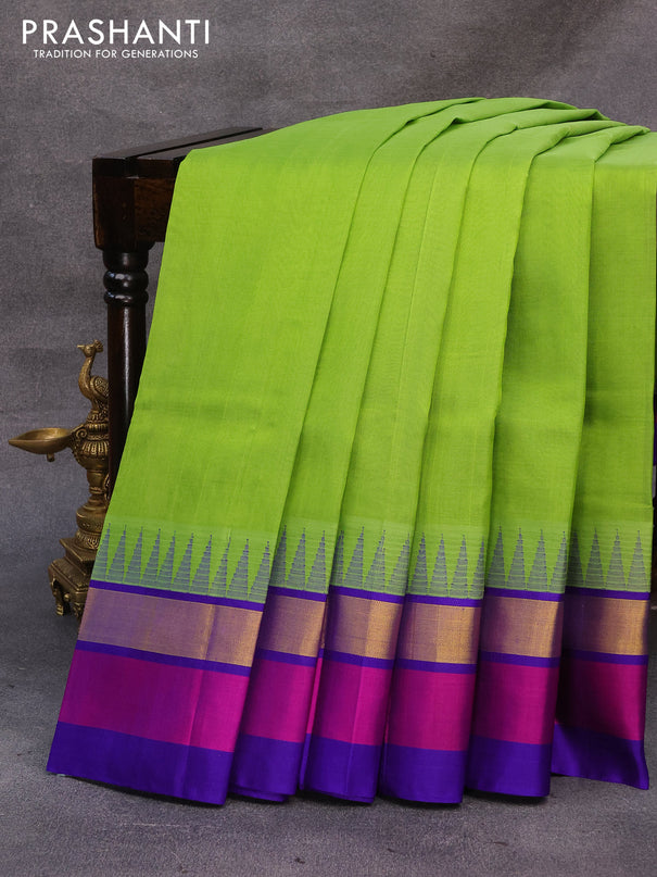 Kuppadam silk cotton saree parrot green and blue with plain body and temple design zari woven simple border