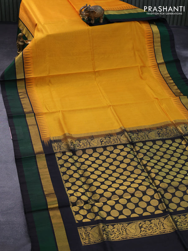 Kuppadam silk cotton saree mustard yellow and black with plain body and temple design zari woven simple border