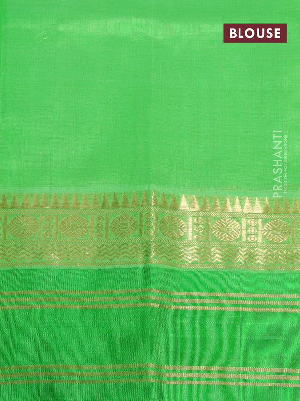 Kuppadam silk cotton saree off white and light green with allover zari checked pattern and temple design zari woven simple border