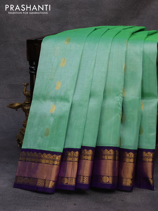 Kuppadam silk cotton saree teal green shade and blue with paisley & rudhraksha zari woven buttas and zari woven border
