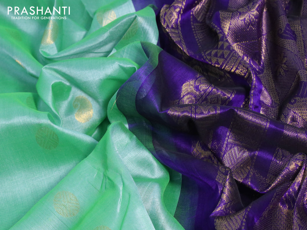 Kuppadam silk cotton saree teal green shade and blue with paisley & rudhraksha zari woven buttas and zari woven border