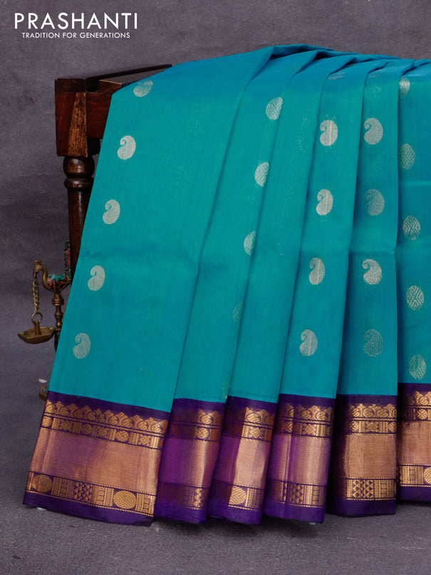 Kuppadam silk cotton saree dual shade of teal blue and blue with paisley & rudhraksha zari woven buttas and zari woven border