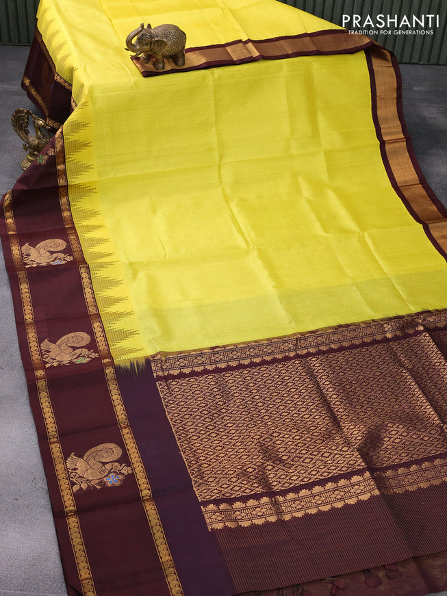 Kuppadam silk cotton saree lime yellow and coffee brown with allover zari checked pattern and rettapet zari woven butta border