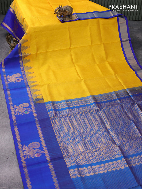 Kuppadam silk cotton saree yellow and blue with allover zari checked pattern and rettapet zari woven butta border