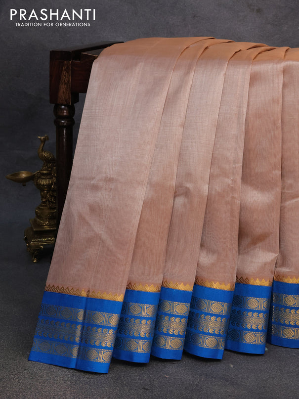 Kuppadam silk cotton saree beige and cs blue with plain body and zari woven border