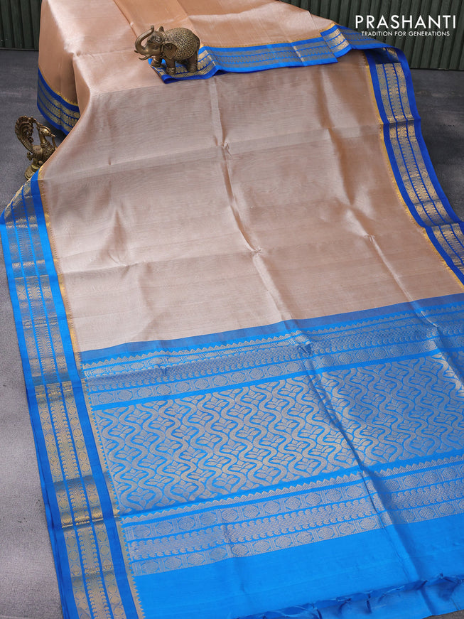 Kuppadam silk cotton saree beige and cs blue with plain body and zari woven border