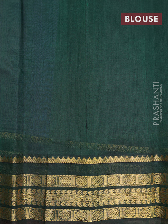 Kuppadam silk cotton saree dual shade of bluish grey and green with plain body and zari woven border