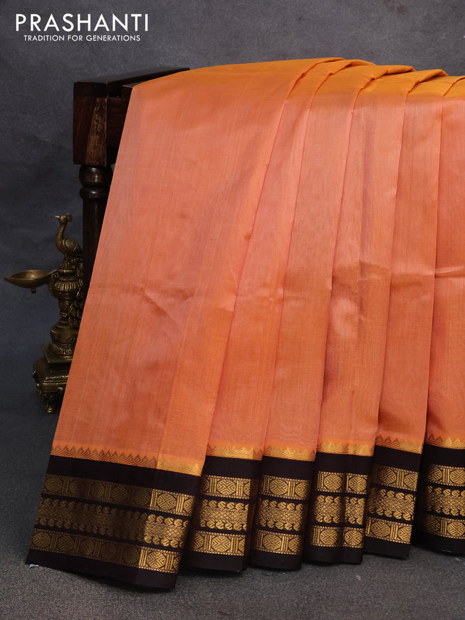 Kuppadam silk cotton saree pastel peach and dark coffee brown with plain body and zari woven border