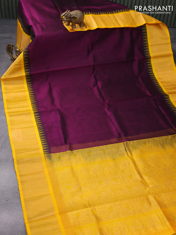 Kuppadam silk cotton saree dark purple and yellow with plain body and temple design zari woven border