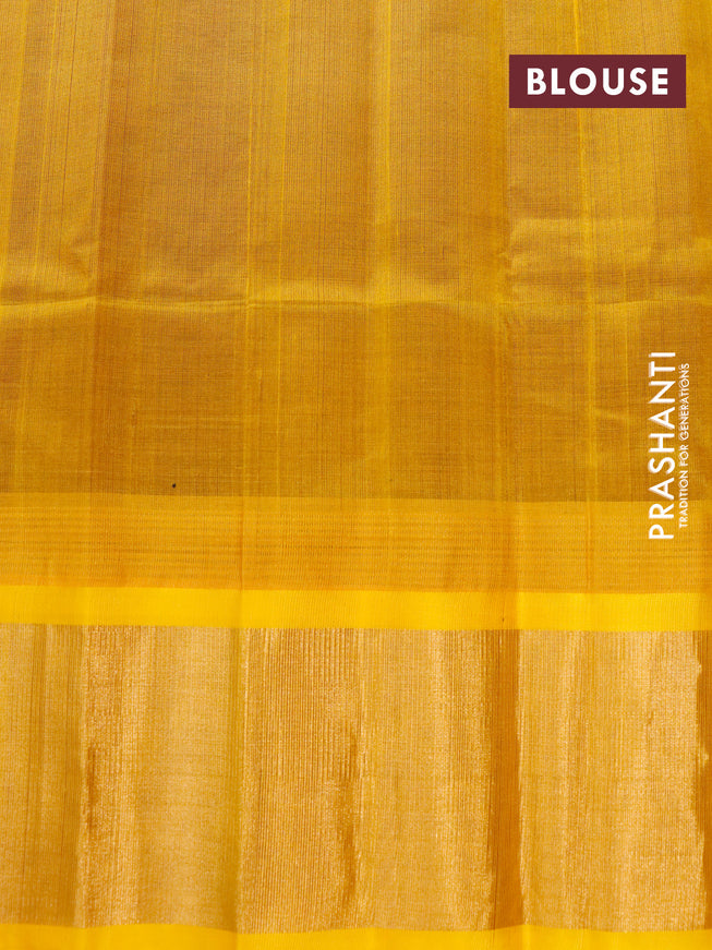 Kuppadam silk cotton saree dark purple and yellow with plain body and temple design zari woven border