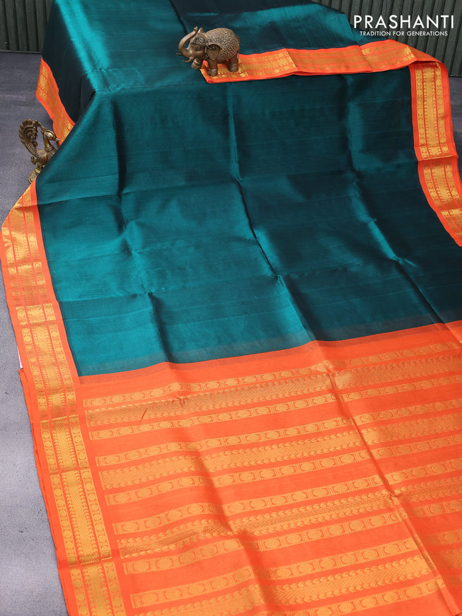 Silk cotton saree peacock green and orange with plain body and zari woven korvai border