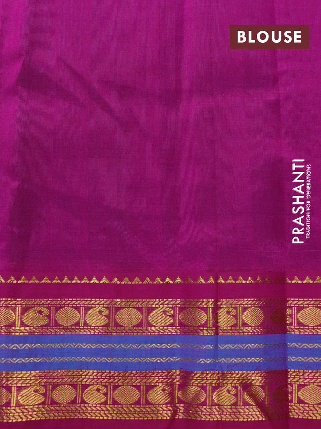 Silk cotton saree dual shade of teal bluish green and purple with plain body and zari woven korvai border