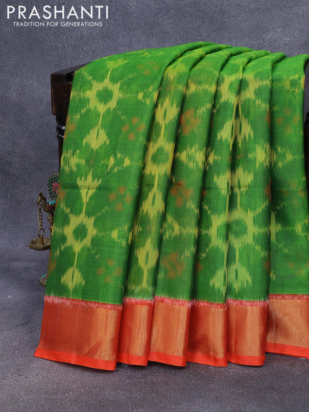Ikat silk cotton saree green and orange with allover ikat weaves and zari woven border