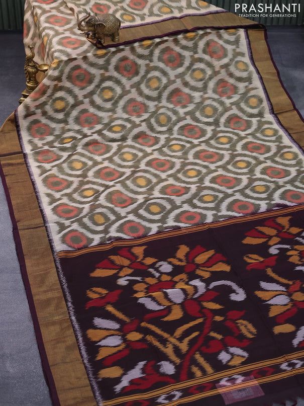 Ikat silk cotton saree cream and deep coffee brown with allover ikat weaves and zari woven border