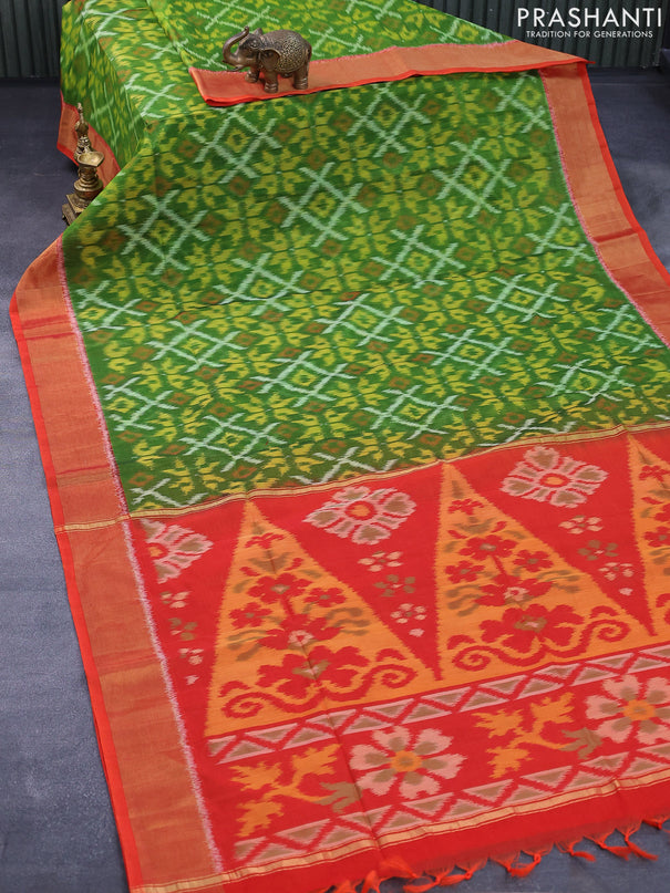 Ikat silk cotton saree light green and orange with allover ikat weaves and zari woven border