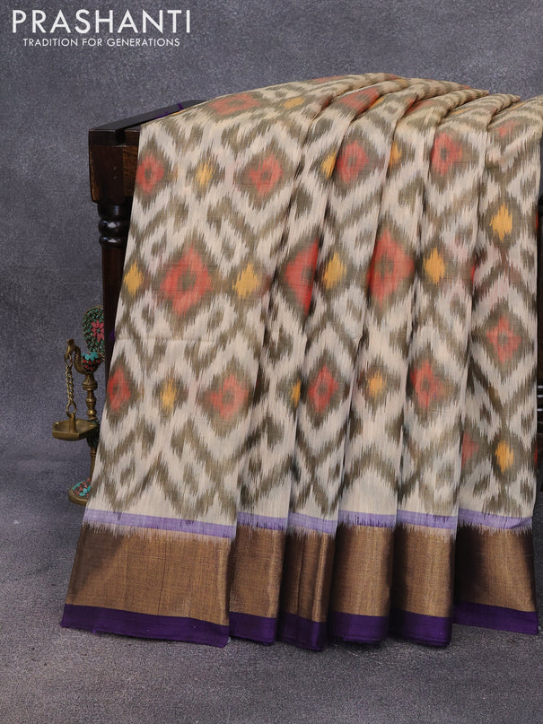 Ikat silk cotton saree cream and blue with allover ikat weaves and zari woven border