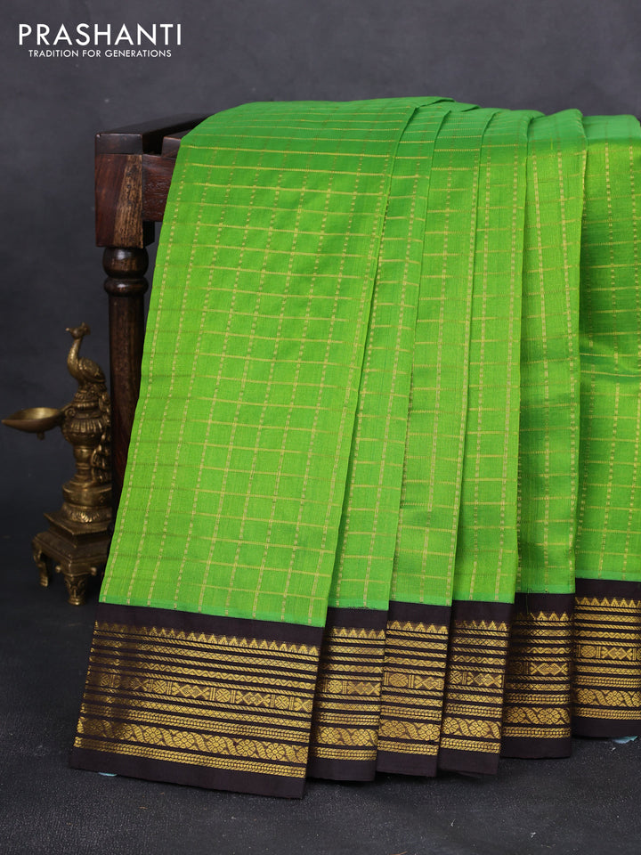 Silk cotton saree light green and deep coffee brown with allover zari checked pattern and zari woven korvai border