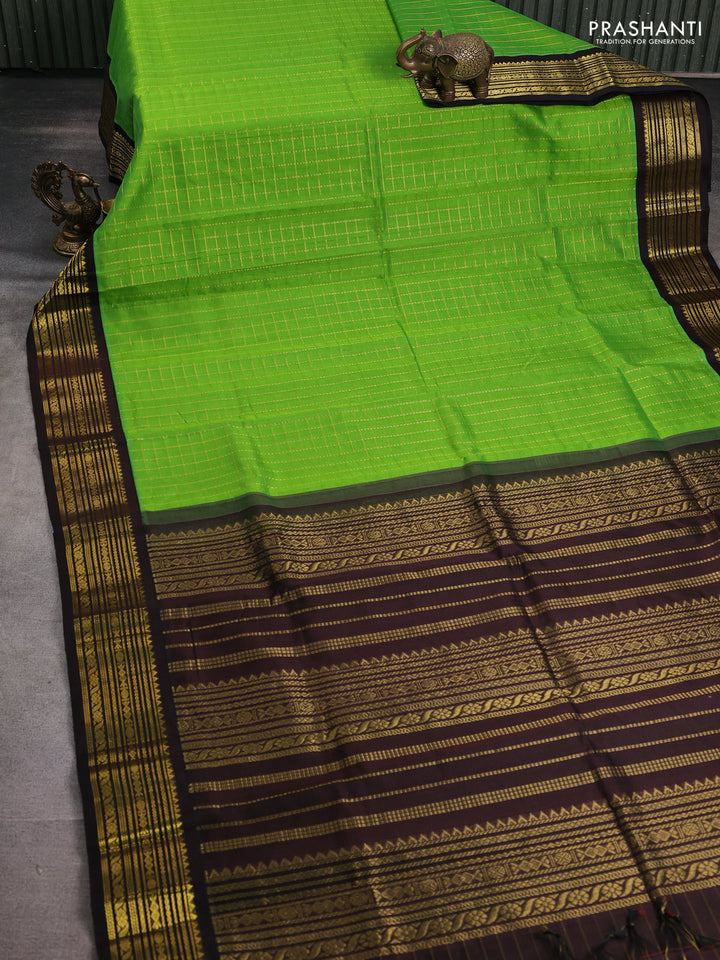 Silk cotton saree light green and deep coffee brown with allover zari checked pattern and zari woven korvai border