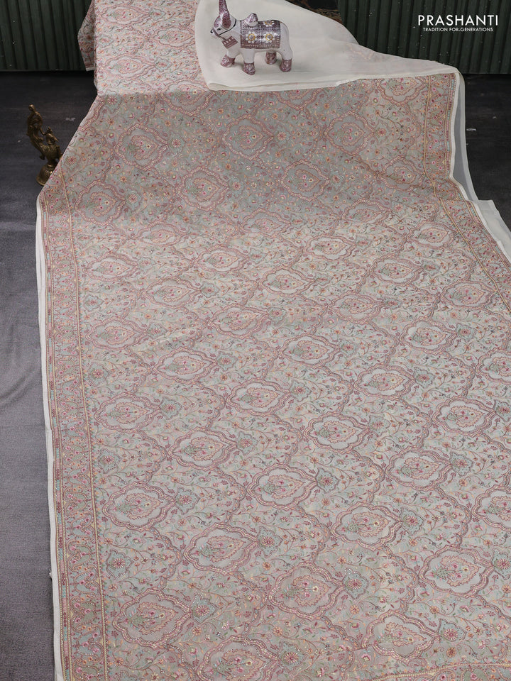 Cream Georgette Saree - Embroidery