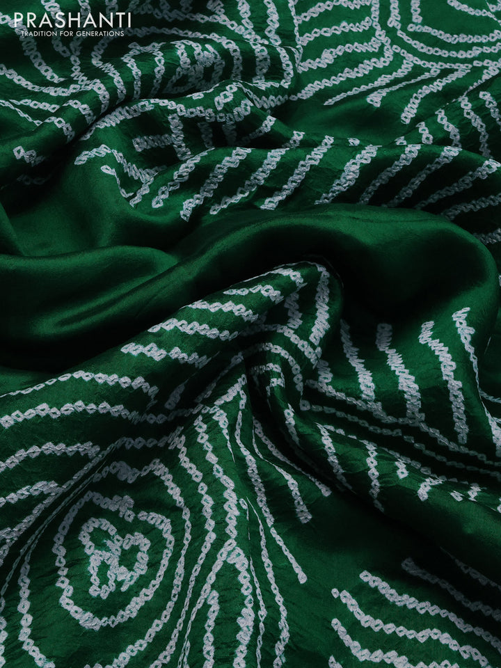 Chiniya silk saree green with allover bandhani prints