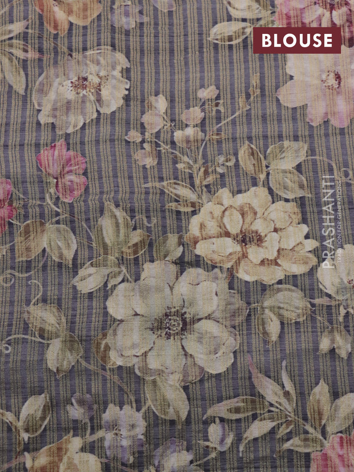 Semi tussar saree grey shade with allover zari woven stripes pattern and floral printed border