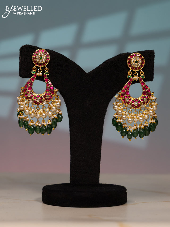 Jadau screw type earring peacock design with kemp jadau kundan stones in pearl & green beads hangings