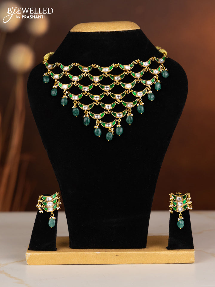 Jadau necklace moon design with green jadau kundan stones in green beads hangings