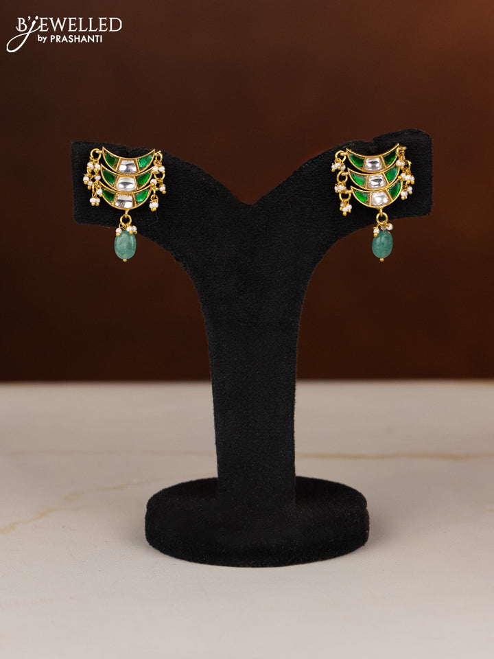 Jadau necklace moon design with green jadau kundan stones in green beads hangings