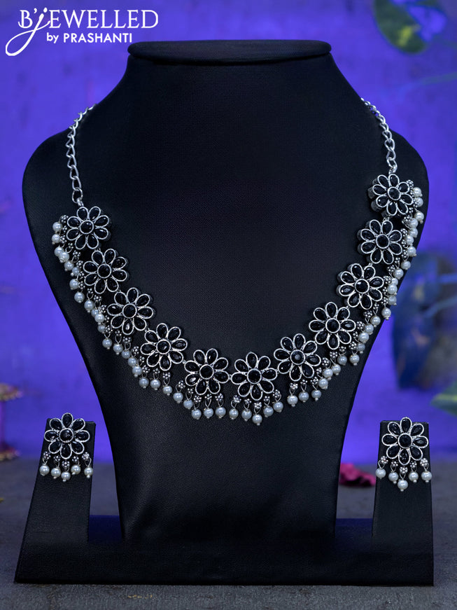 Oxidised necklace floral design with black stones and pearl hangings