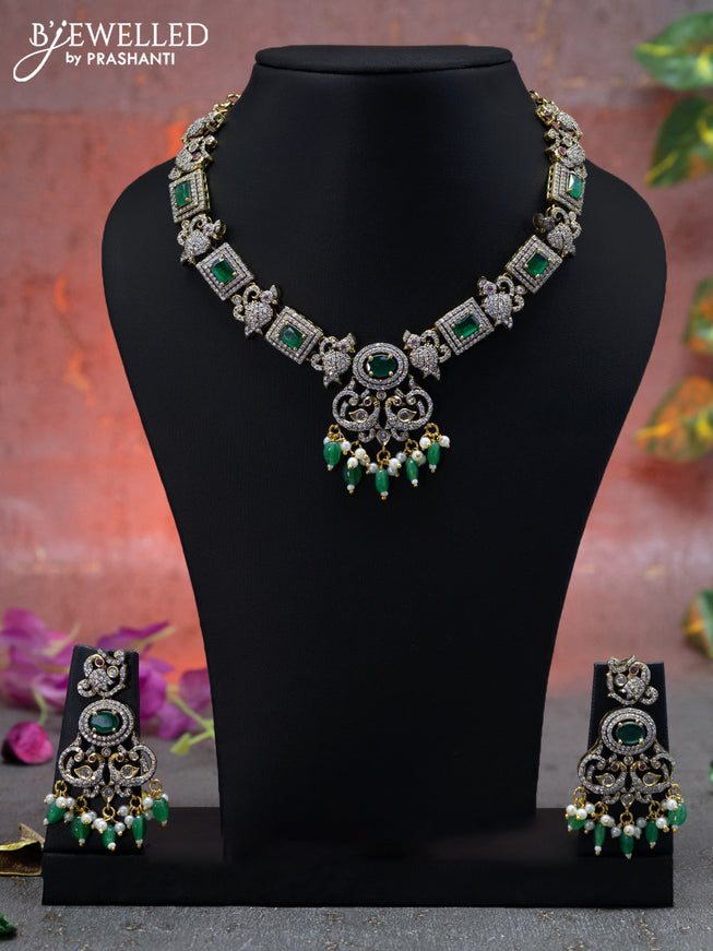 Necklace peacock & parrot design with emerald & cz stones and beads hangings in victorian finish