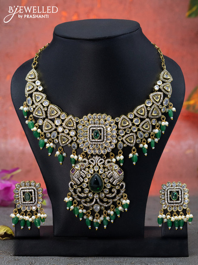 Necklace elephant design with emerald & cz stones and beads hangings in victorian finish