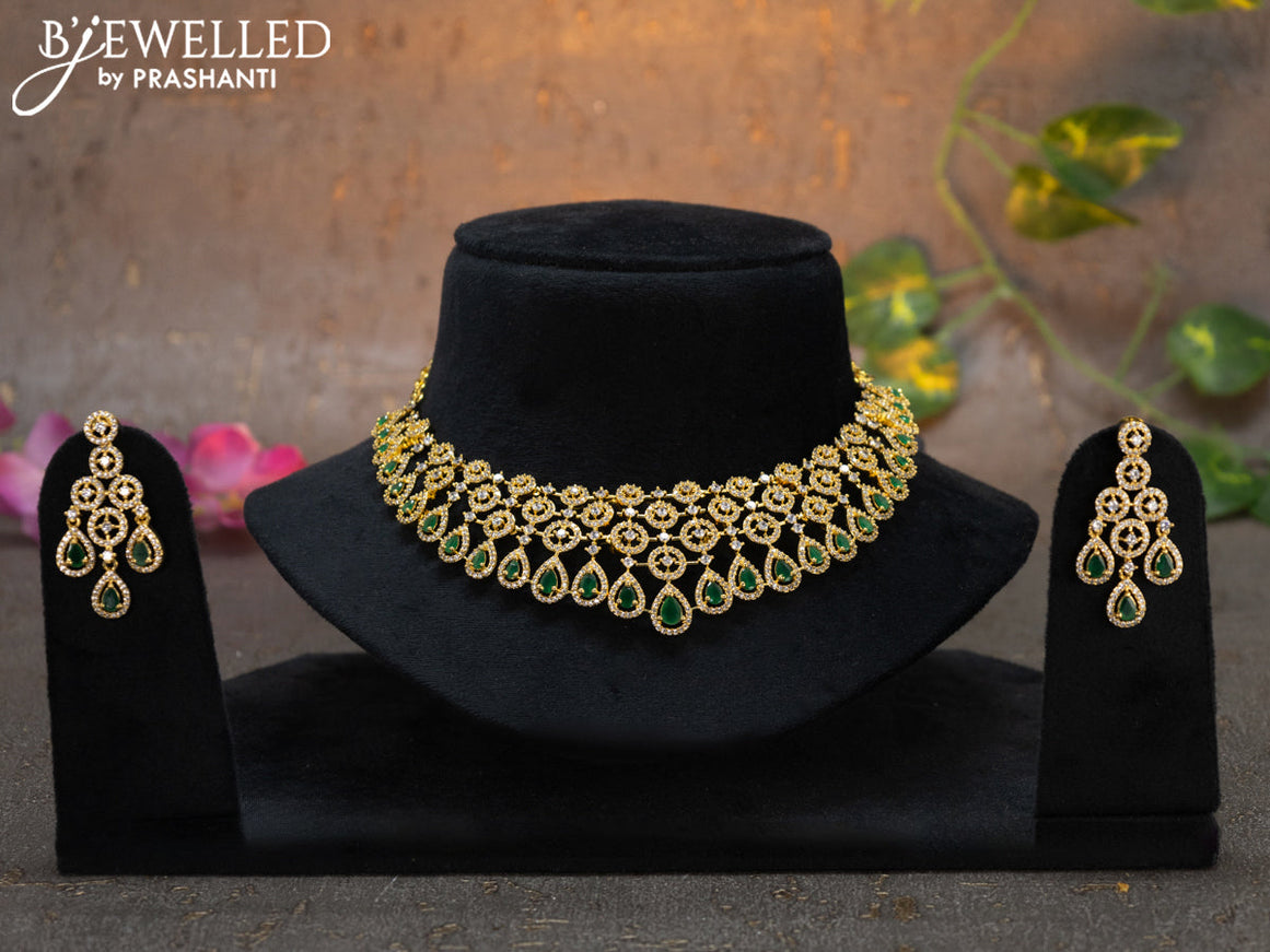 Zircon choker with emerald and cz stones in gold finish