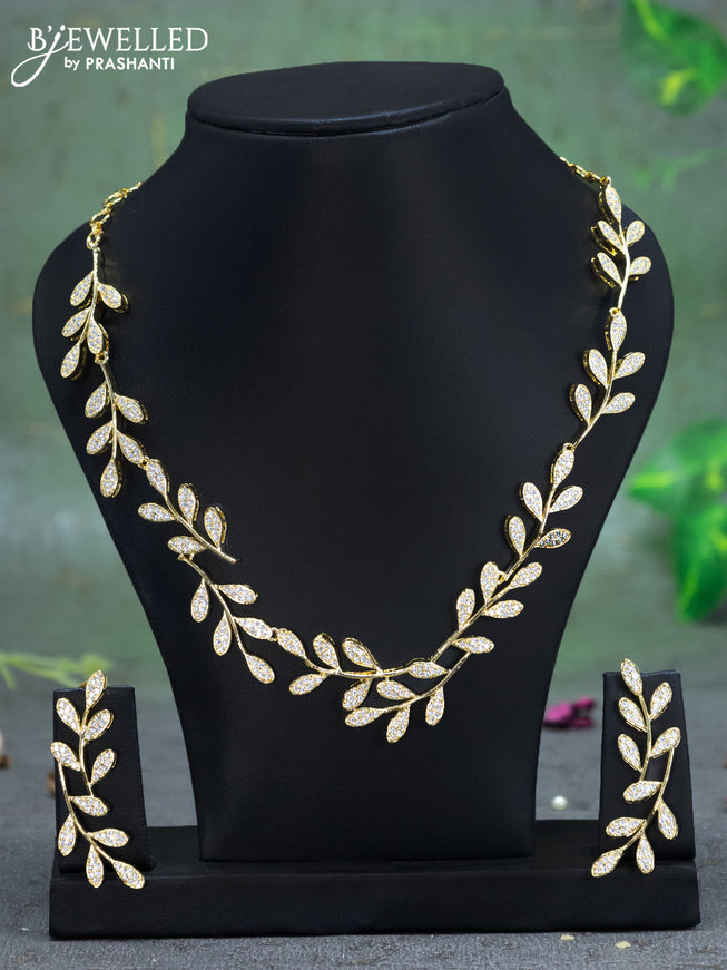 Zircon necklace leaf design with cz stones in gold finish