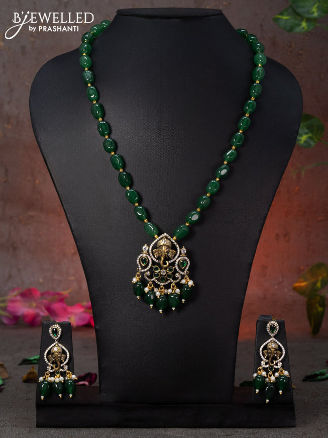 Beaded green necklace ganasha design with emerald & cz stones and beads hanging in victorian finish
