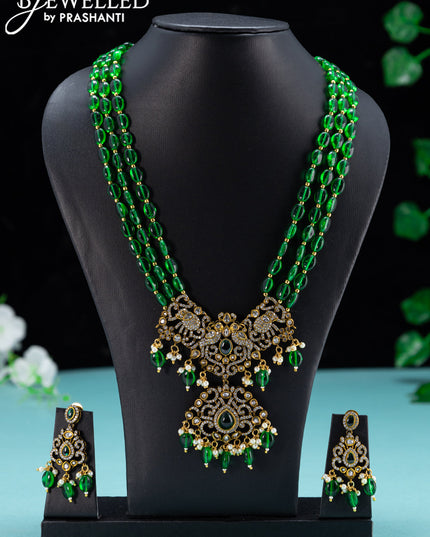 Beaded green necklace with emerald & cz stones and beades hanging in victorian finish