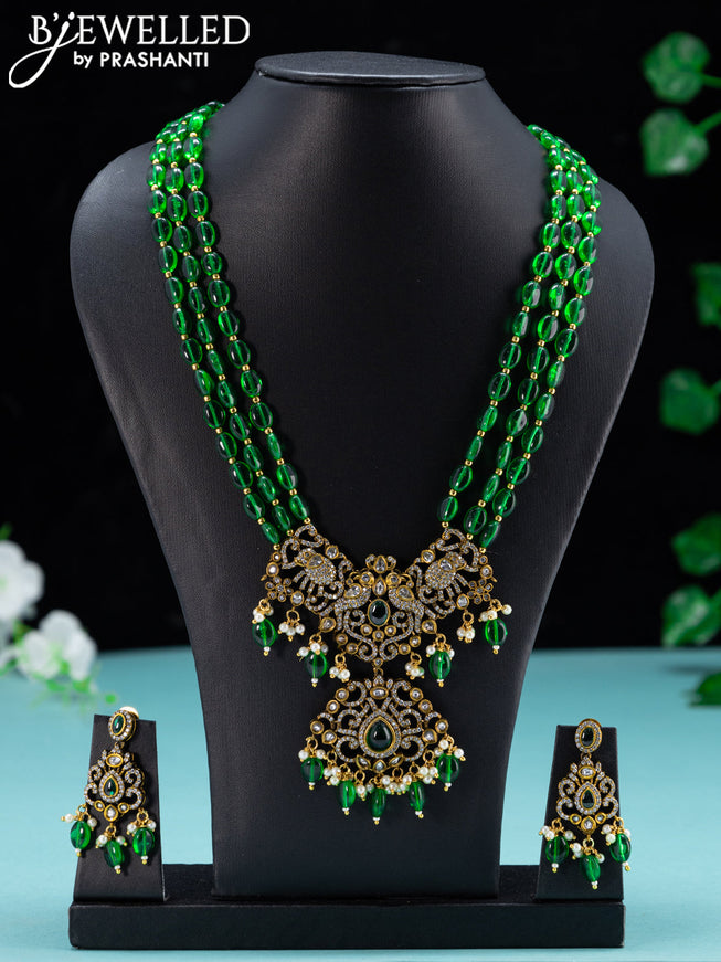 Beaded green necklace with emerald & cz stones and beades hanging in victorian finish