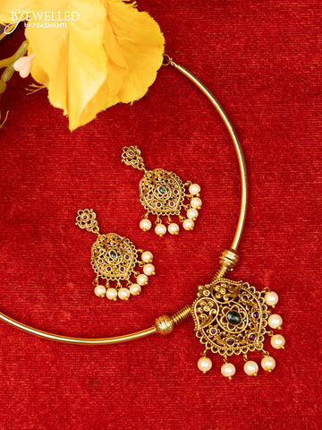 Ring type choker with floral design in red and green kemp stones and pearl hanging