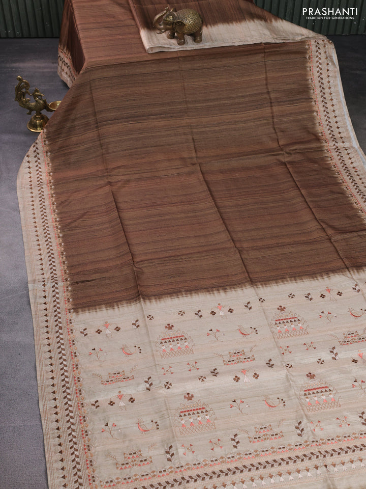 Semi tussar saree brown shade and beige with plain body and embroidery pallu & border