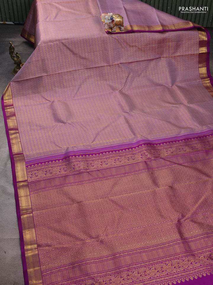 Pure kanchipuram silk saree pastel lavender and purple with allover zari woven brocade weaves and small zari woven border