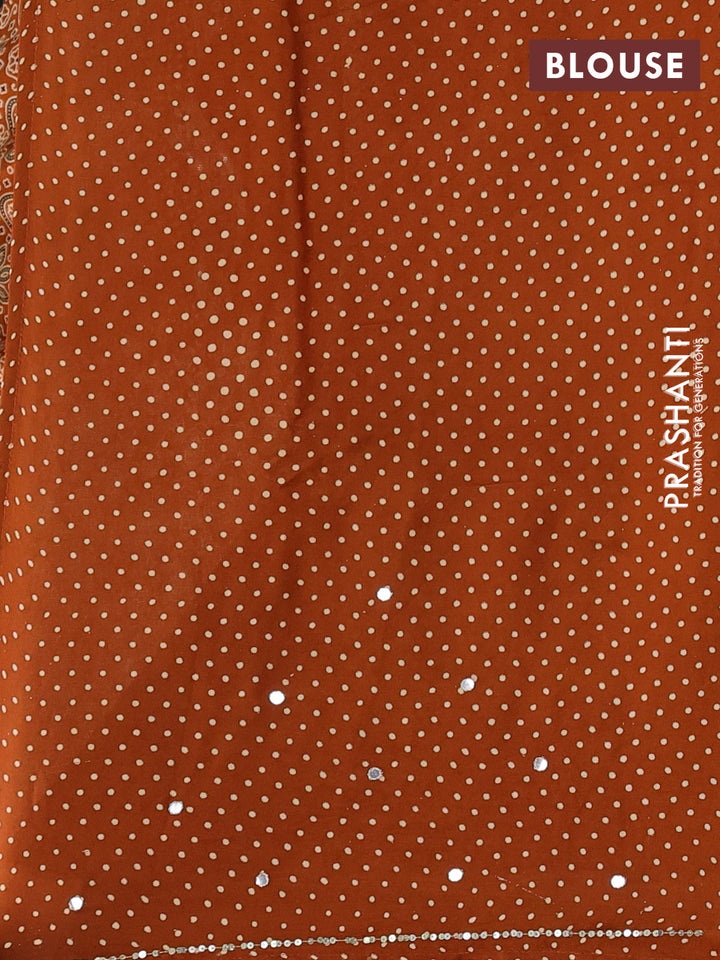 Modal silk saree dark mustard with allover ajrakh prints and mirror & sequin embroidery pallu