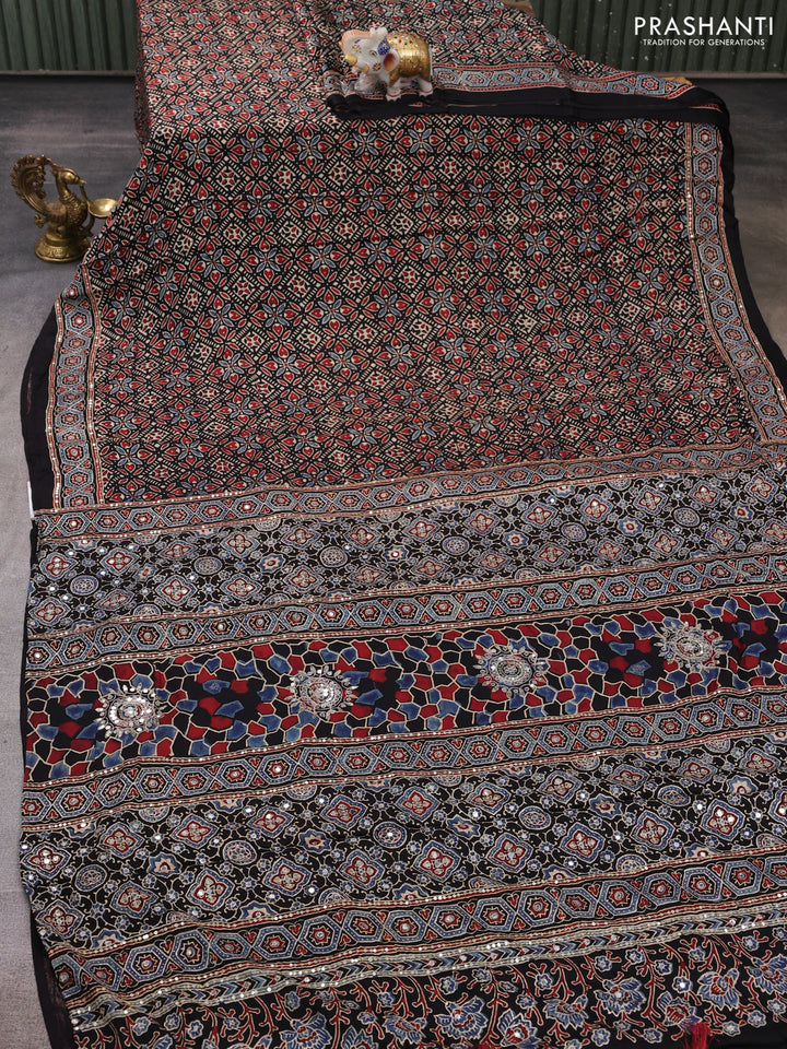 Modal silk saree black with allover ajrakh prints and mirror & sequin embroidery pallu