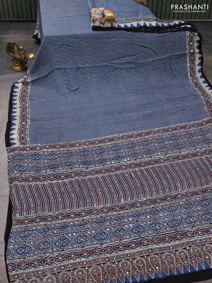 Modal silk saree indigo blue with allover stripe prints and ajrakh prints mirror & sequin embroidery pallu