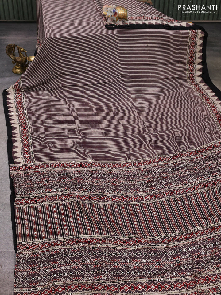 Modal silk saree brown with allover stripe prints and ajrakh prints mirror & sequin embroidery pallu